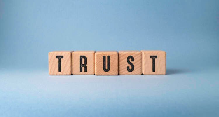 Business leaders discussing trust and transparency for effective transformation - Global Banking & Finance Review