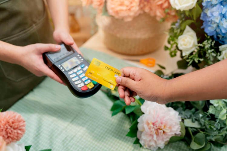 Close up of contactless payment transaction symbolizing fintech solutions for SMEs - Global Banking & Finance Review