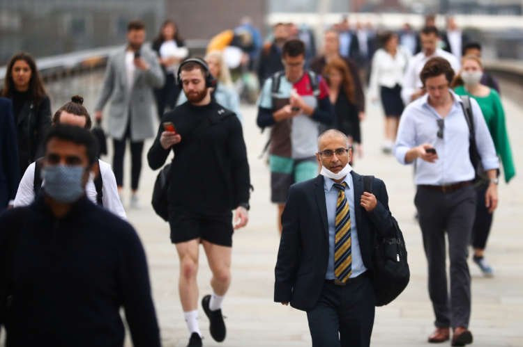 Image for UK jobless rate falls as workers drop out of labour force