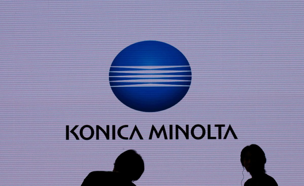 Konica Minolta logo with headlines about job cuts and restructuring - Global Banking & Finance Review