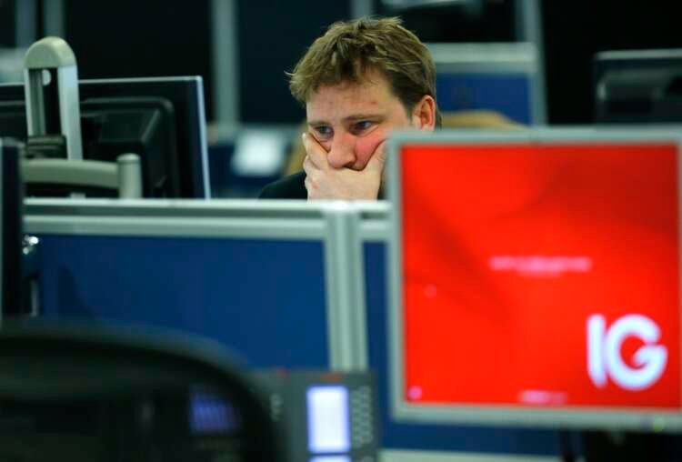 Broker analyzing market trends in London after BoE's rate hike - Global Banking & Finance Review