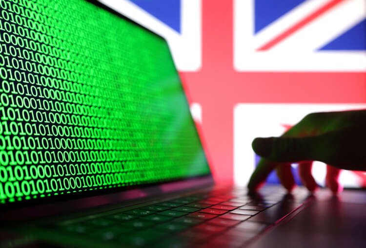 Illustration of a laptop with binary codes and UK flag, highlighting cyber security incident - Global Banking & Finance Review