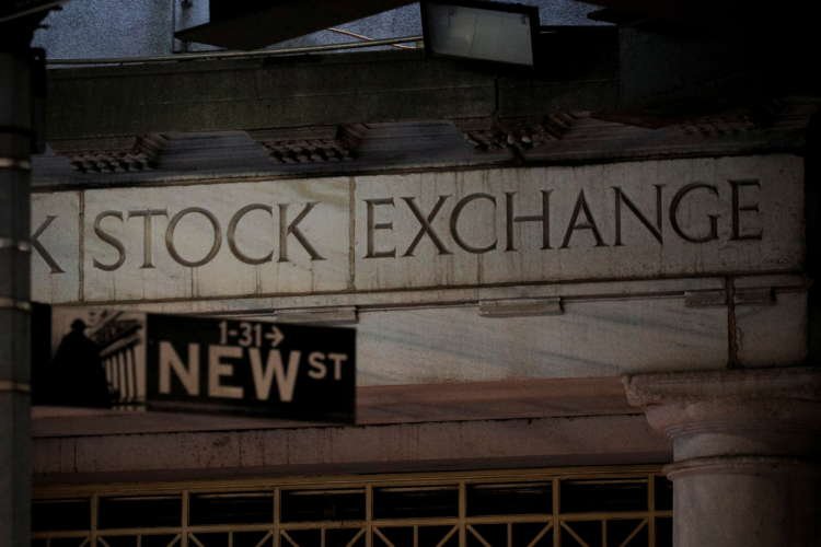 A sign is seen outside the 11 Wall St. entrance of the NYSE in New York