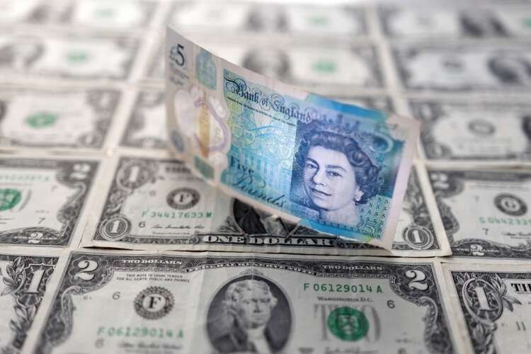 British pound banknote alongside U.S. dollar notes, symbolizing currency fluctuations - Global Banking & Finance Review
