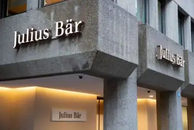 Image for Swiss bank Julius Baer freezes hiring after market downturn hits earnings