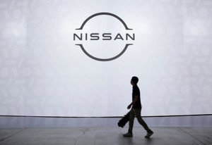 S&P Global Ratings logo with Nissan Motor Company financial analysis - Global Banking & Finance Review