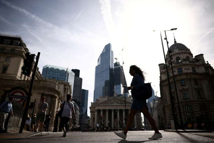People walking in London’s financial district amidst recession concerns - Global Banking & Finance Review