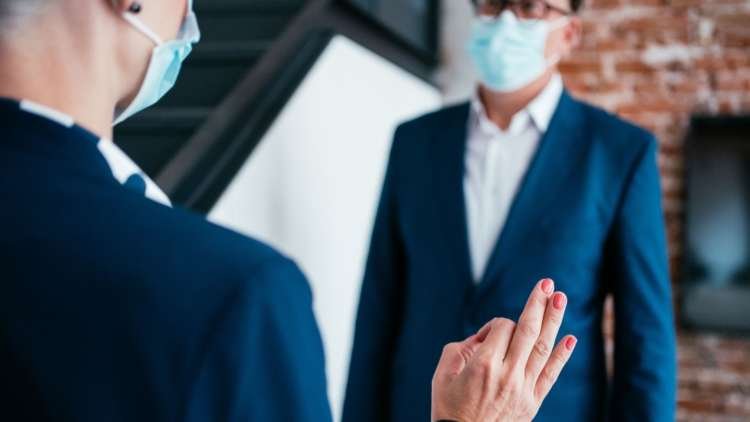 Employee practicing mindfulness at home to reduce anxiety during the pandemic - Global Banking & Finance Review