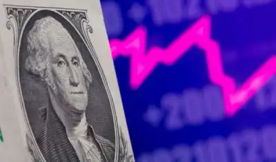 Image for Dollar rises moderately on jump in U.S. inflation