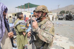 Afghan American soldier expressing concern over sister's safety after Trump refugee order - Global Banking & Finance Review