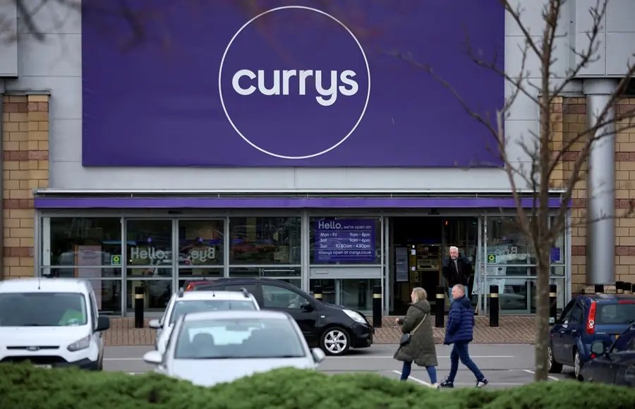 Currys logo with holiday sales figures, highlighting profit outlook increase - Global Banking & Finance Review