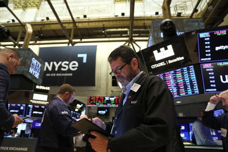 Traders monitor stock prices at NYSE amid U.S. earnings rally - Global Banking & Finance Review
