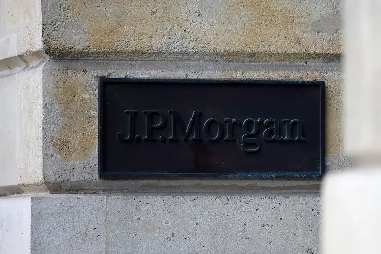 JPMorgan logo with financial charts, representing its exit from Net-Zero Banking Alliance - Global Banking & Finance Review