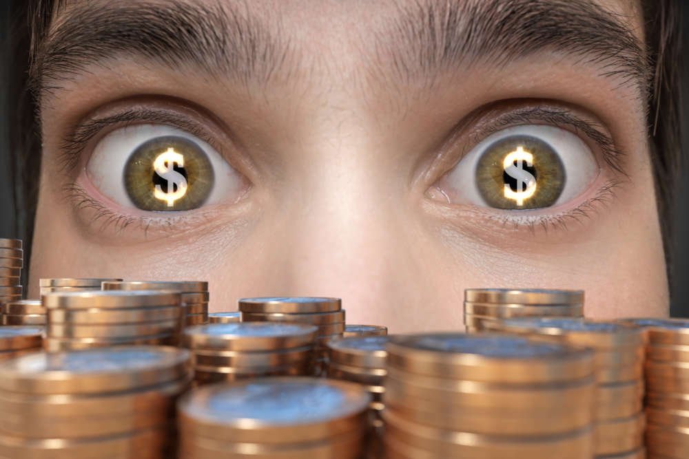 Young man excited by cash, reflecting changing attitudes to money post-Covid - Global Banking & Finance Review