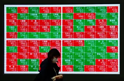 Image for Asian shares pinned near three-month lows, dollar towers at 2-yr peak