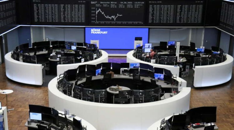 Image for European shares hover near record highs; commodity stocks weigh