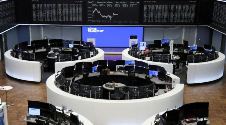 European shares hover near record highs; commodity stocks weigh