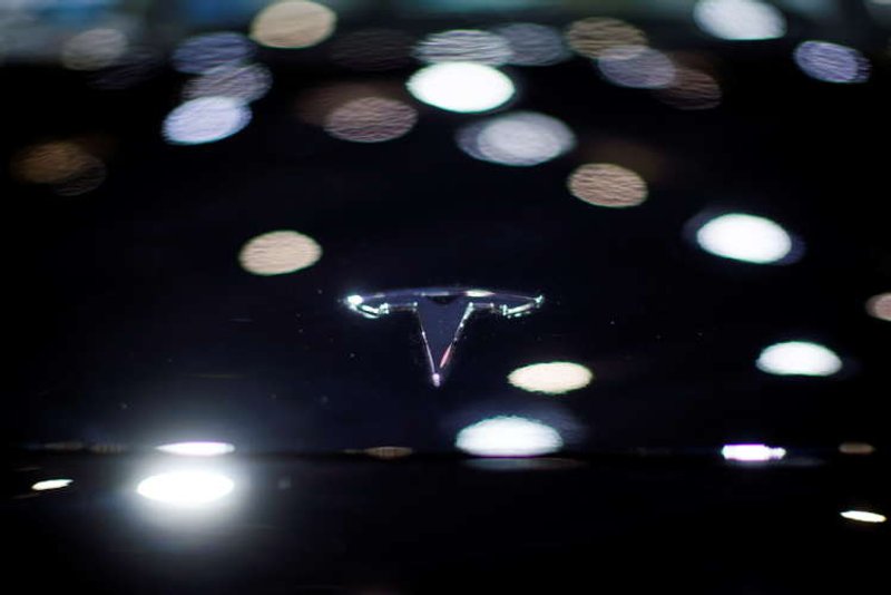 Image for Tesla apologizes after customer protested at autoshow, to share car data with Chinese regulator