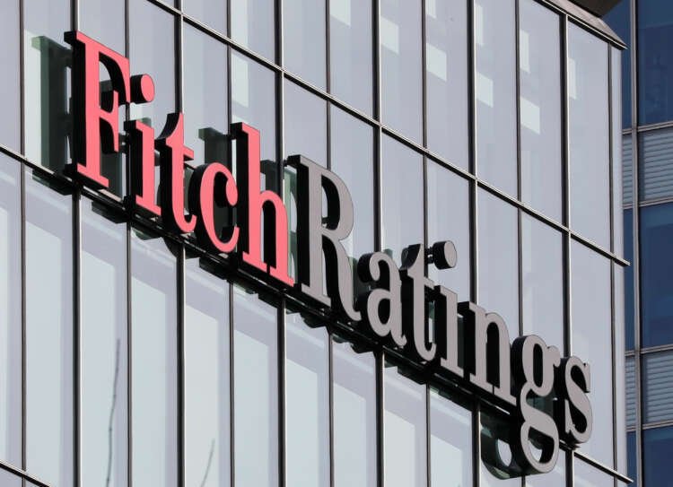 Fitch Ratings logo at Canary Wharf, highlighting Hungary's EU fund issues - Global Banking & Finance Review