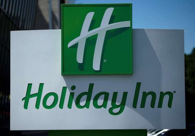 Holiday Inn logo displayed prominently, representing IHG's hotel brand recovery - Global Banking & Finance Review