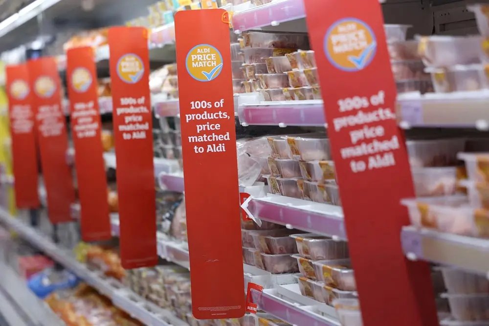 Sainsbury's supermarket store showcasing grocery items, reflecting UK sales trends - Global Banking & Finance Review