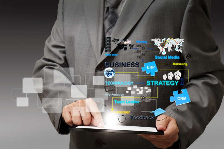 Businessman interacting with a tablet, symbolizing the human touch in digital banking - Global Banking & Finance Review