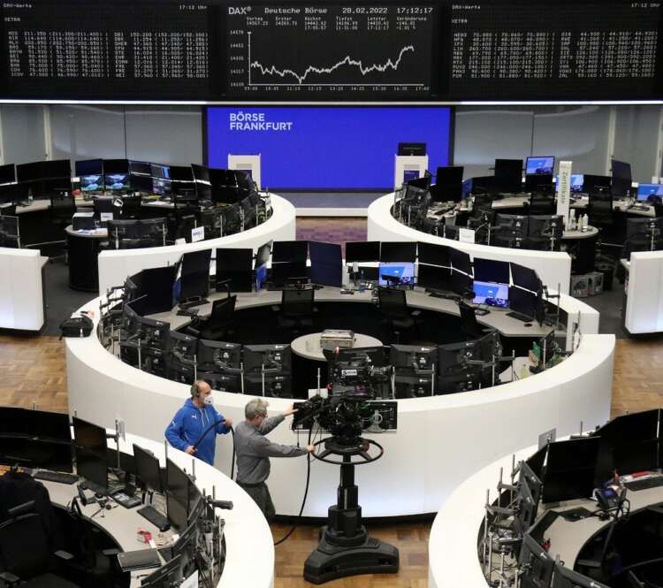Image for European shares slide on weak earnings, Ukraine jitters
