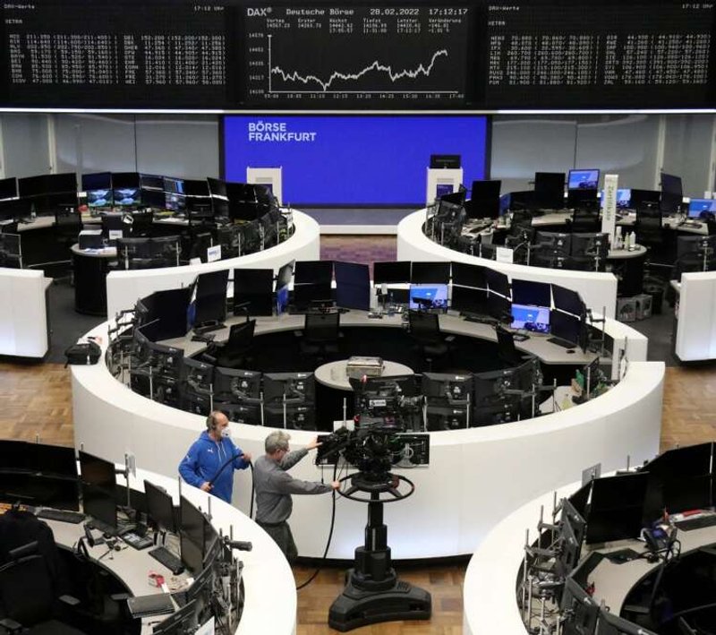 Image for European shares slide on weak earnings, Ukraine jitters