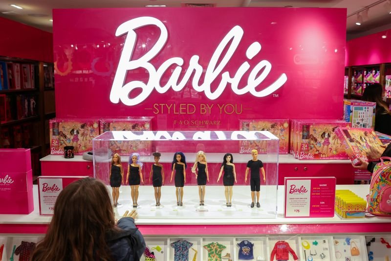 Mattel's logo and toy products highlighting the company's financial forecast - Global Banking & Finance Review