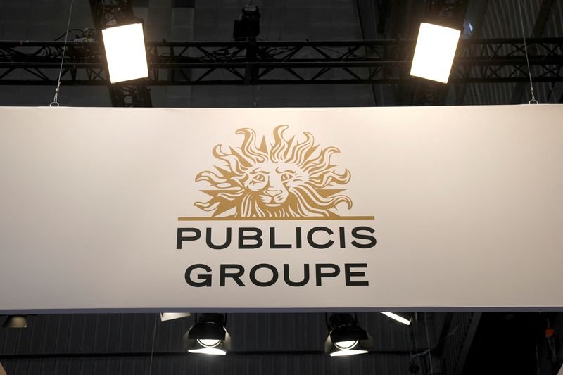 Publicis advertising group logo with a financial growth graph - Global Banking & Finance Review
