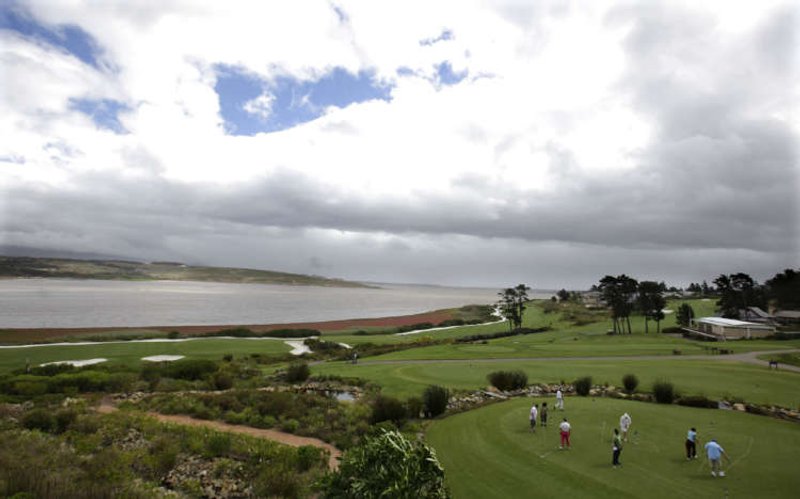 Image for Teed off: As COVID fuels S. Africa’s housing crisis, golf courses feel the heat