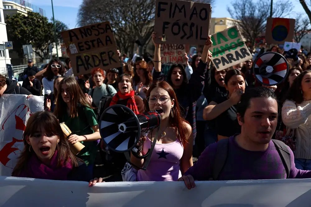 Demonstrators protesting for climate action and fossil fuel phase-out in Portugal - Global Banking & Finance Review