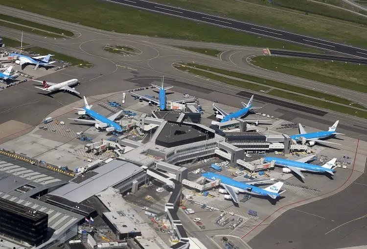 KLM airplane at Schiphol airport, highlighting the airline's call for quieter planes - Global Banking & Finance Review