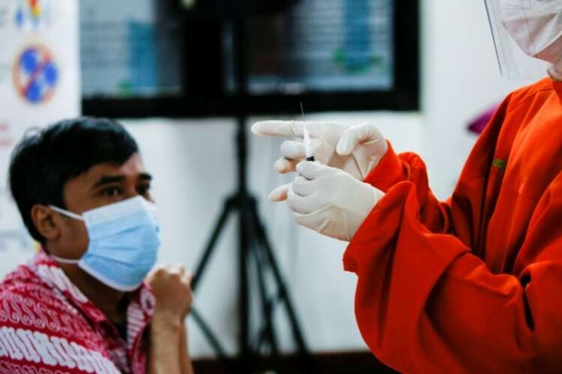 Image for Chickens, cows, apartments offered up in Asia’s vaccination lucky draws