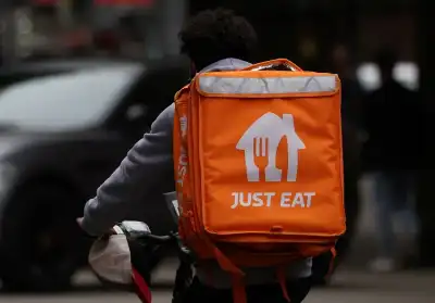 Image for Just Eat Takeaway to withdraw from London stock exchange, citing costs
