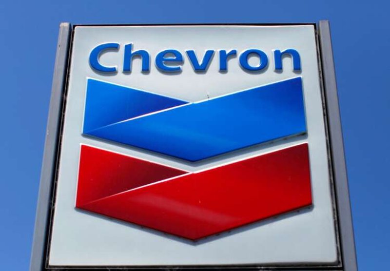 Image for Chevron tops profit estimates, joins share buyback stampede