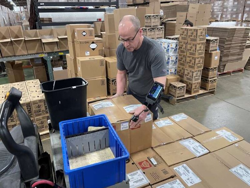 Image for Amazon’s net loss prompts query: Has it built too many warehouses?