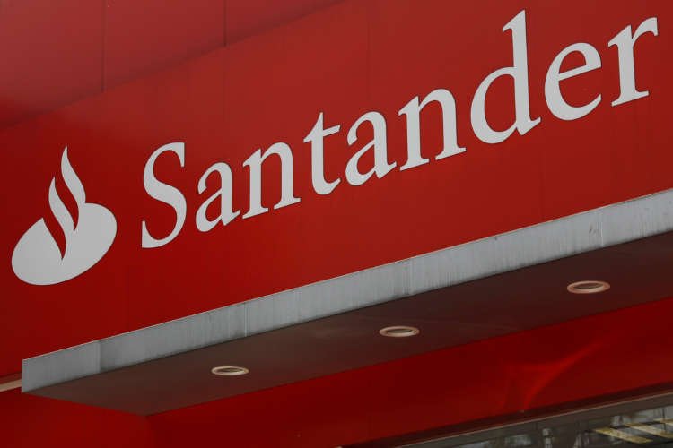 Banco Santander logo with a financial backdrop illustrating Mexican market acquisition - Global Banking & Finance Review