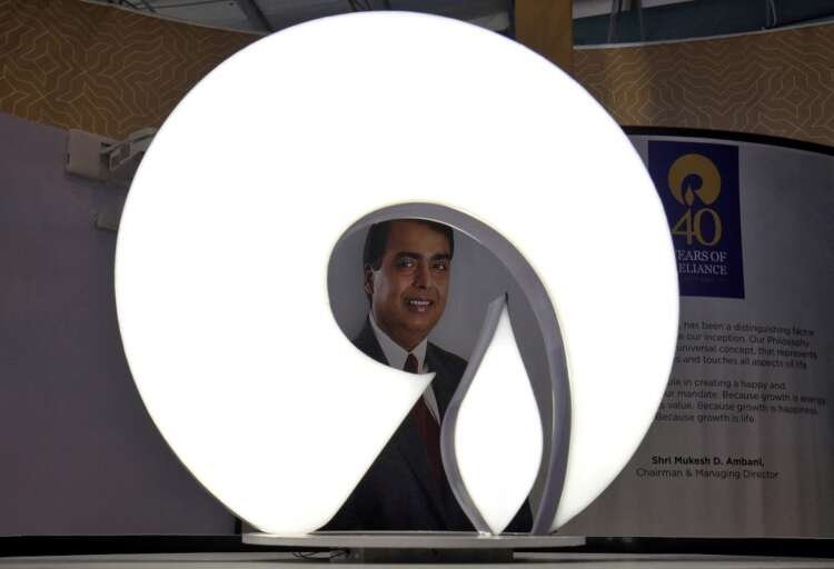 Reliance Industries logo at trade show, marking entry of Pret A Manger in India - Global Banking & Finance Review
