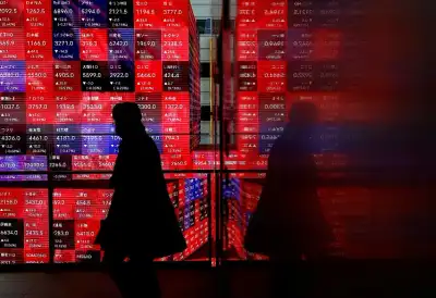 Image for Asia shares stumble on China anxiety; gold and bitcoin rally