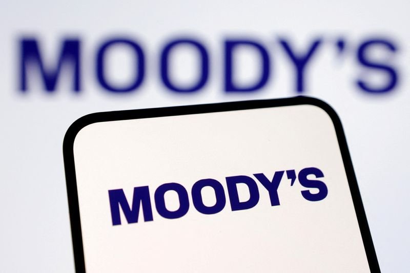 Moody's Corp logo with financial growth chart reflecting robust demand - Global Banking & Finance Review