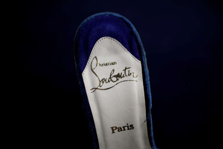 Image for Exor puts on red-soled shoes with 24% stake in shoemaker Louboutin