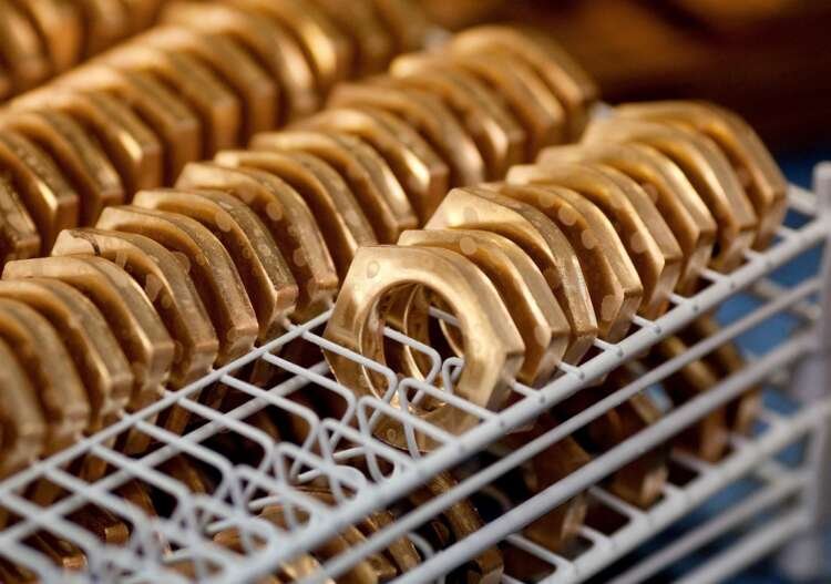 Pre-produced watch parts at Argor-Heraeus highlighting challenges in gold sourcing - Global Banking & Finance Review