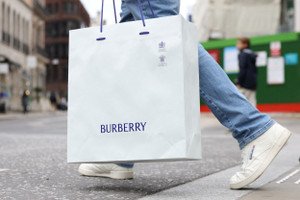 Burberry store showcasing luxury trench coats and scarves for holiday shoppers - Global Banking & Finance Review
