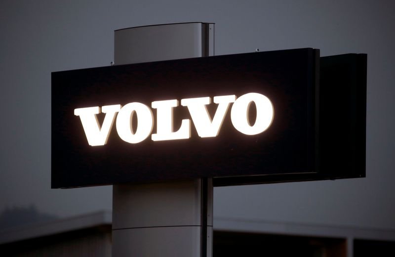 Volvo Cars logo with a declining sales graph representing December's 3% drop - Global Banking & Finance Review