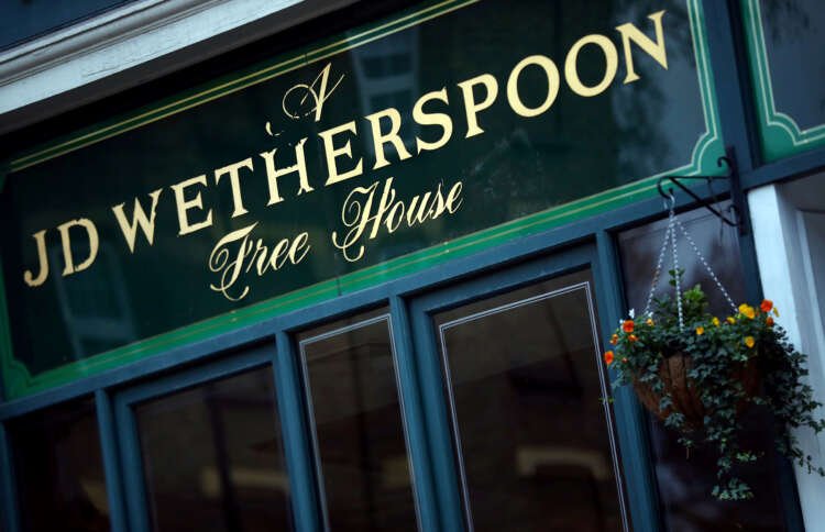 Wetherspoon pub logo displayed prominently, reflecting UK’s rising sales - Global Banking & Finance Review