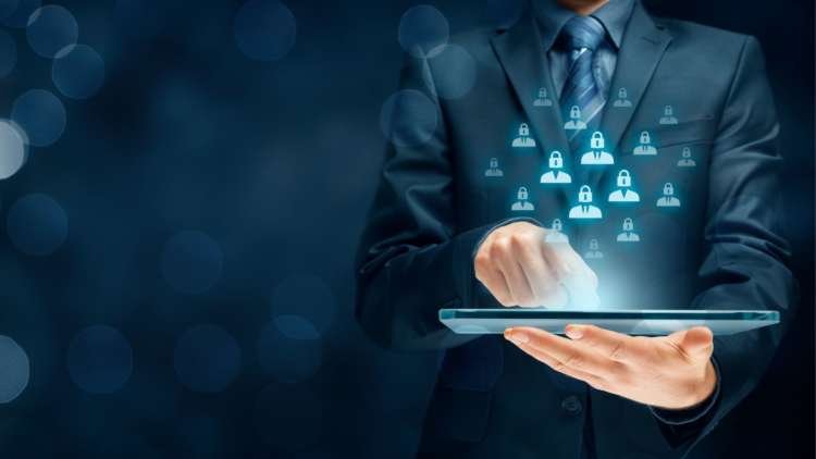 Person working from home, using a laptop, emphasizing data security in remote work - Global Banking & Finance Review