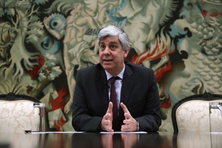 FILE PHOTO: Portugal’s Finance Minister and Eurogroup President Mario Centeno gestures during an interview with Reuters in Lisbon