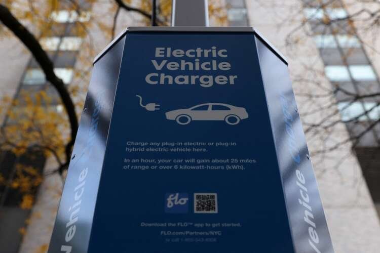 Electric vehicle charger in Manhattan, symbolizing EV infrastructure growth - Global Banking & Finance Review
