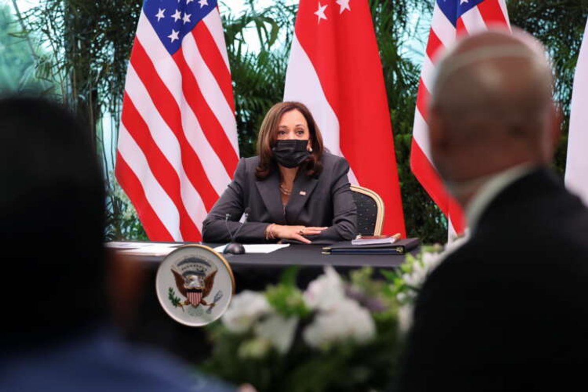 Kamala Harris speaking at a podium on U.S.-China relations during her visit to Singapore - Global Banking & Finance Review